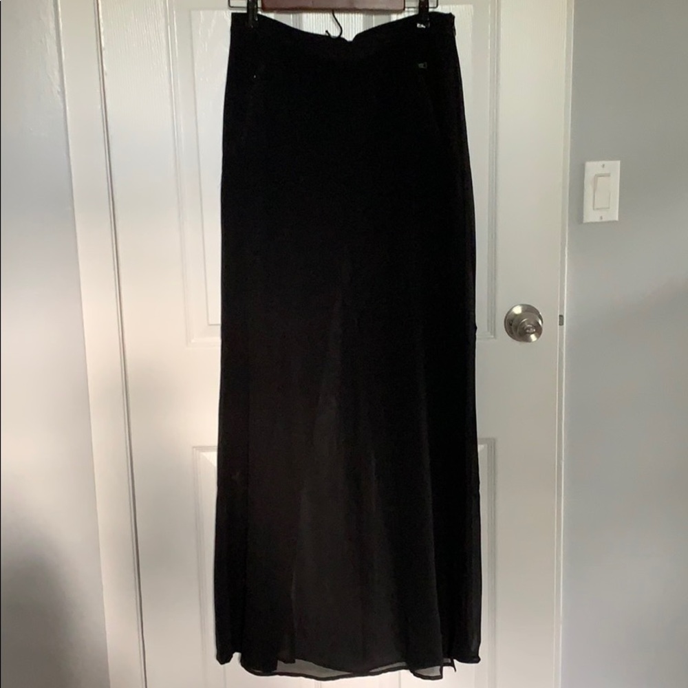 BCBG black skirted trouser.  Sheer overlay